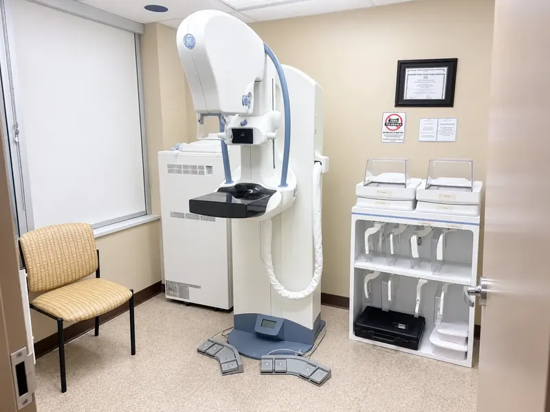 The mammography room at 960 Lawrence Avenue West, with the mammography unit and a chair by the window