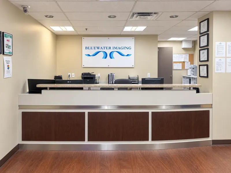 The reception desk at Bluewater Imaging, 960 Lawrence Avenue West, with the Bluewater Imaging sign on the wall behind it